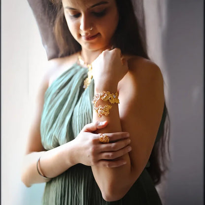 Handcrafted 22k gold-plated brass Lyric Cuff featuring a Baroque Pearl – organic sculptural statement bracelet designed by Samdisha Bagga