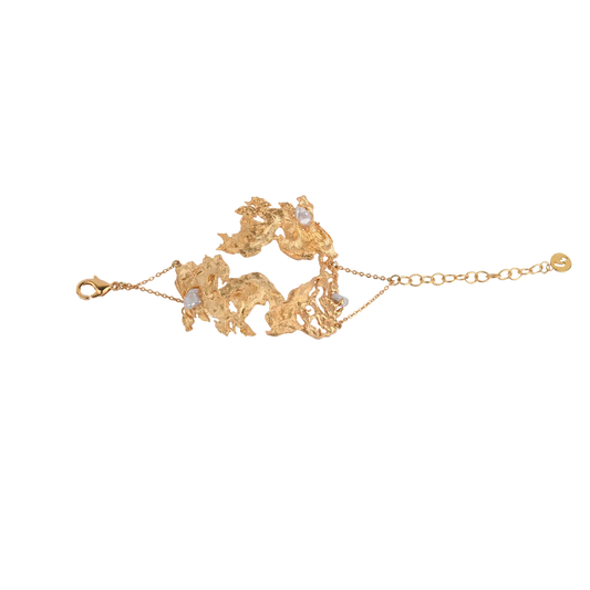 Handcrafted 22k gold-plated brass Lyric Cuff featuring a Baroque Pearl – organic sculptural statement bracelet designed by Samdisha Bagga